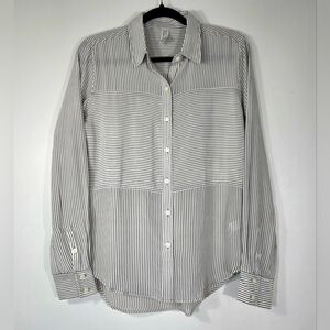 SPANX LOW MAINTENANCE 100% SILK BUTTON DOWN SHIRT.